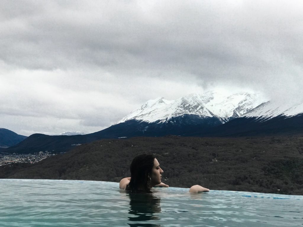 girl-in-an-infinity-pool-near-the-mountains